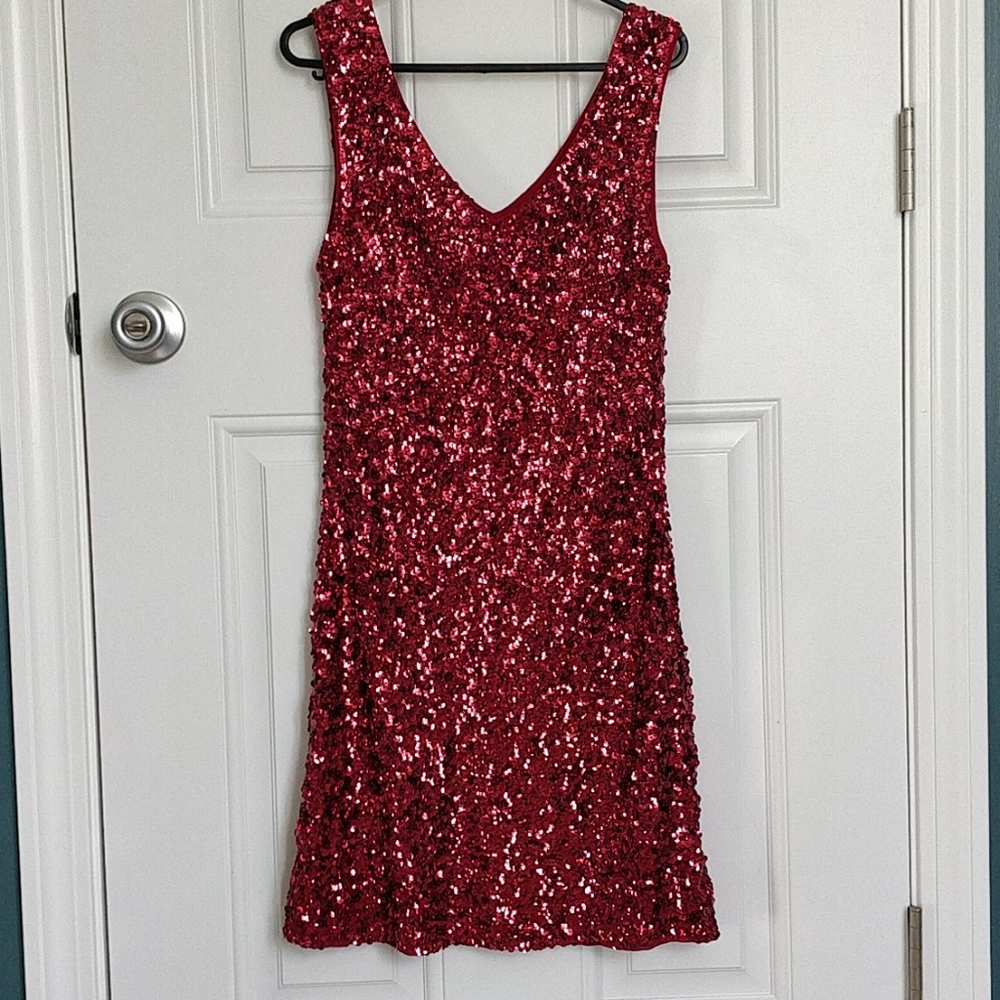 Like new short sleeveless red sequen dress